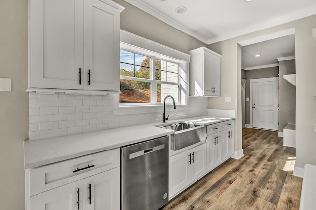 kitchen with white cabinets, dark wood-type flooring, and dishwasher