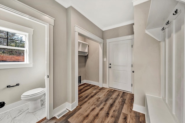 1154 Barrow Hills Dr, Huddleston, VA 24104 - mudroom featuring baseboards and crown molding