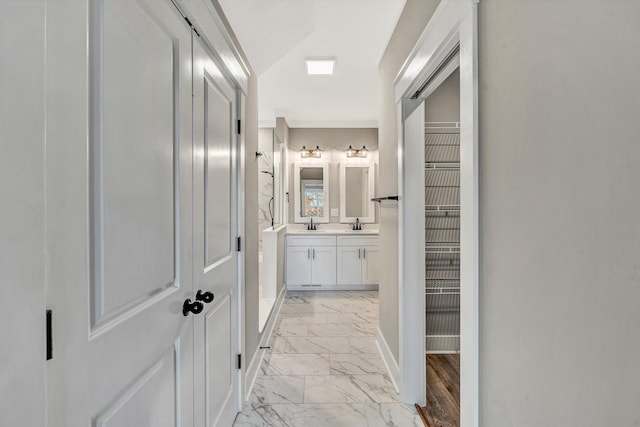 1154 Barrow Hills Dr, Huddleston, VA 24104 - corridor with light marble finish flooring, baseboards, and a sink