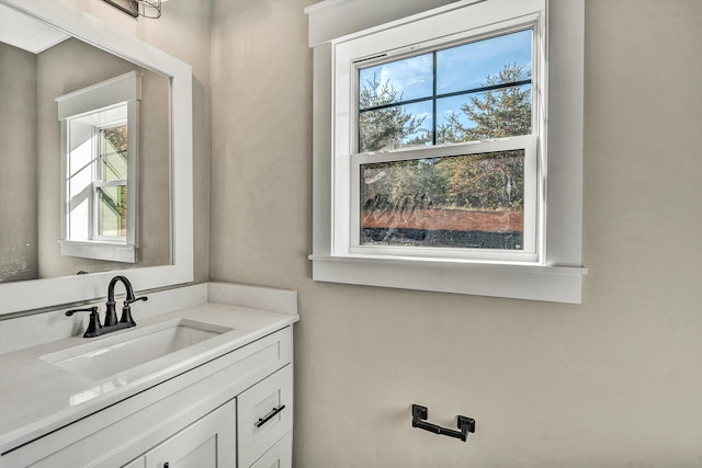 bathroom featuring vanity and a wealth of natural light