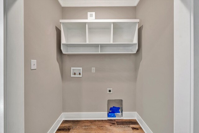 1154 Barrow Hills Dr, Huddleston, VA 24104 - laundry area with hookup for an electric dryer, washer hookup, wood finished floors, and baseboards