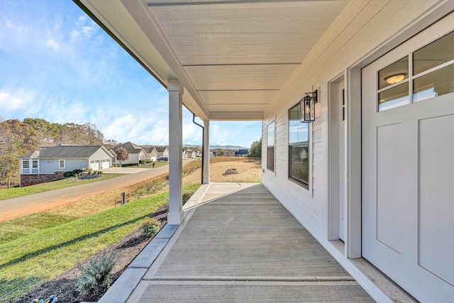 1154 Barrow Hills Dr, Huddleston, VA 24104 - view of patio / terrace with a porch and a residential view