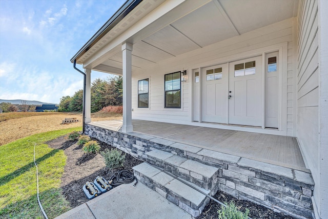 1154 Barrow Hills Dr, Huddleston, VA 24104 - property entrance featuring covered porch and a lawn
