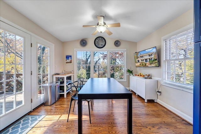 home office featuring ceiling fan, hardwood / wood-style floors, and lofted ceiling