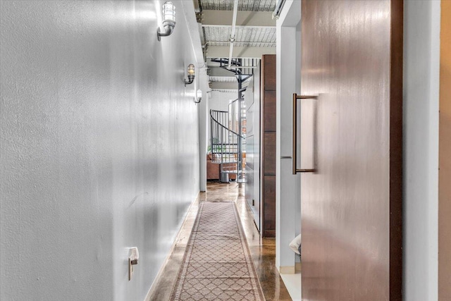 hallway with tile patterned flooring