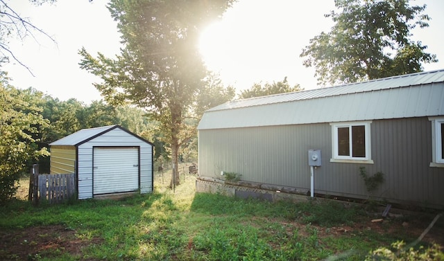 view of outdoor structure with a yard