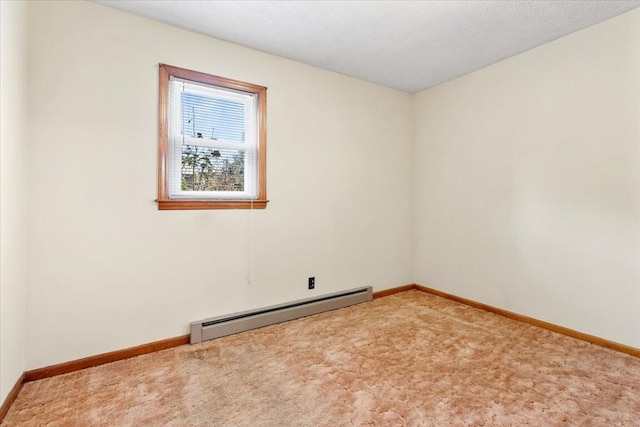 unfurnished room with carpet floors, a textured ceiling, and a baseboard radiator