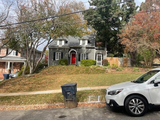 view of front of property with a front lawn