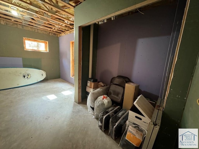 bathroom with concrete flooring