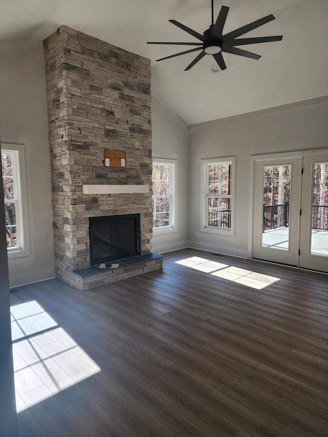 unfurnished living room with hardwood / wood-style flooring and plenty of natural light