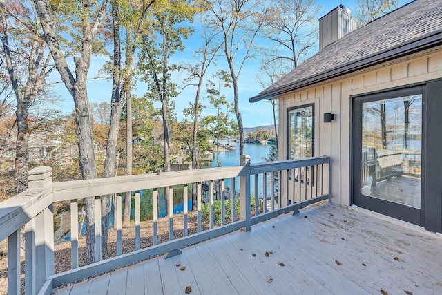 deck featuring a water view