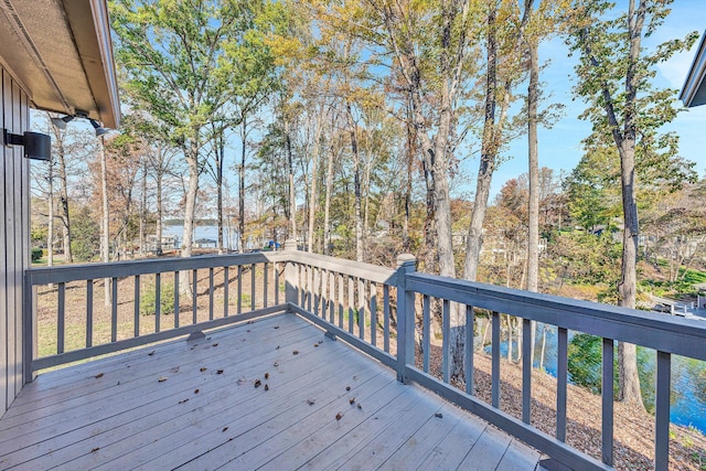 wooden terrace with a water view