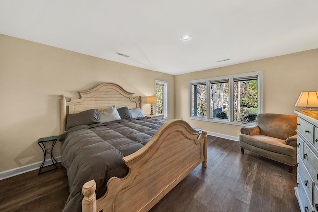 bedroom featuring dark hardwood / wood-style floors