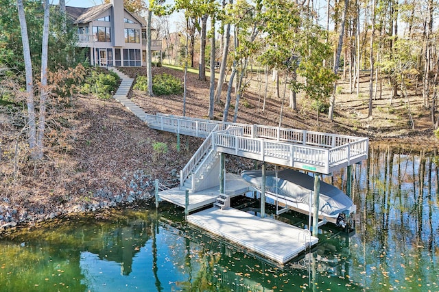 view of dock with a water view