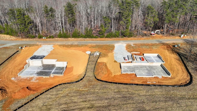 aerial view with a wooded view