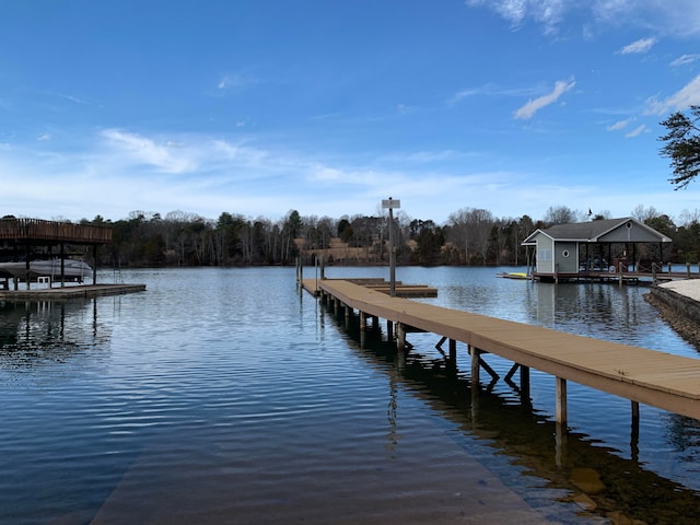 dock area featuring a water view