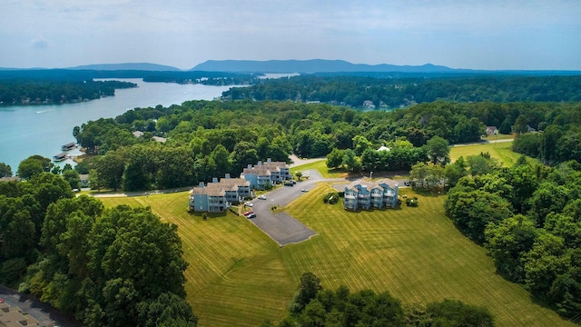 aerial view with a water and mountain view and a rural view