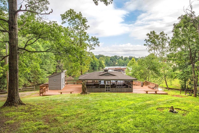 view of yard featuring a wooden deck