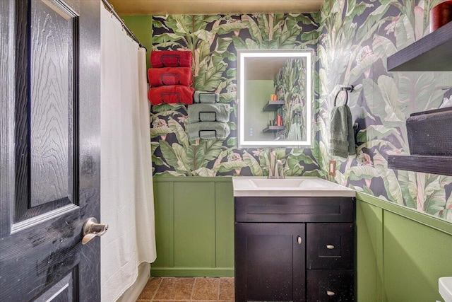 100 Surber Dr, Moneta, VA 24121 - full bath featuring wallpapered walls, vanity, and a wainscoted wall