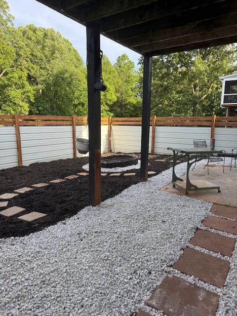 100 Surber Dr, Moneta, VA 24121 - fenced backyard featuring a patio