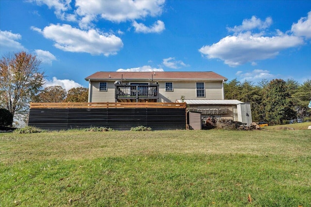 100 Surber Dr, Moneta, VA 24121 - back of house featuring a wooden deck and a lawn