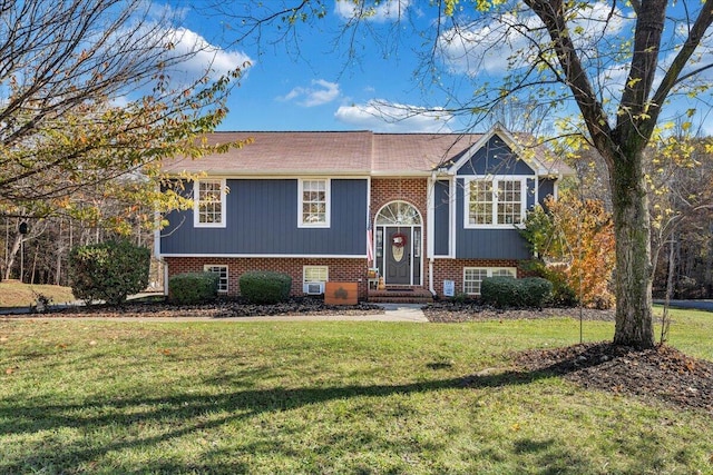 100 Surber Dr, Moneta, VA 24121 - split foyer home with brick siding, a front yard, and entry steps