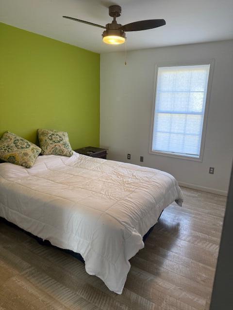 100 Surber Dr, Moneta, VA 24121 - bedroom featuring a ceiling fan and baseboards