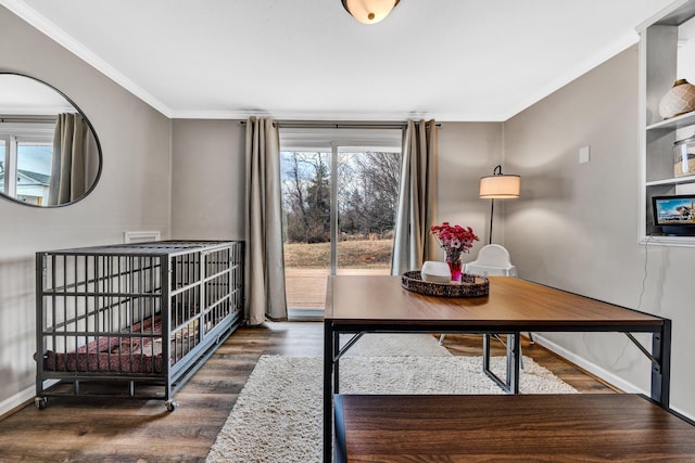 office area with dark wood-type flooring and crown molding