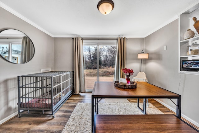 bedroom with dark wood-type flooring and ornamental molding