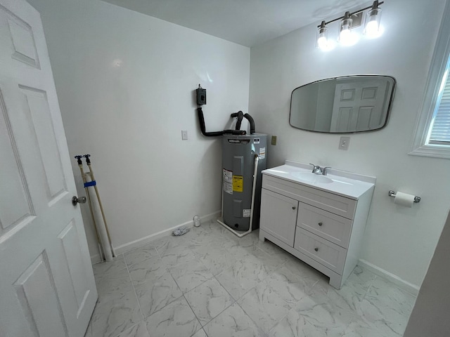 bathroom with water heater and vanity