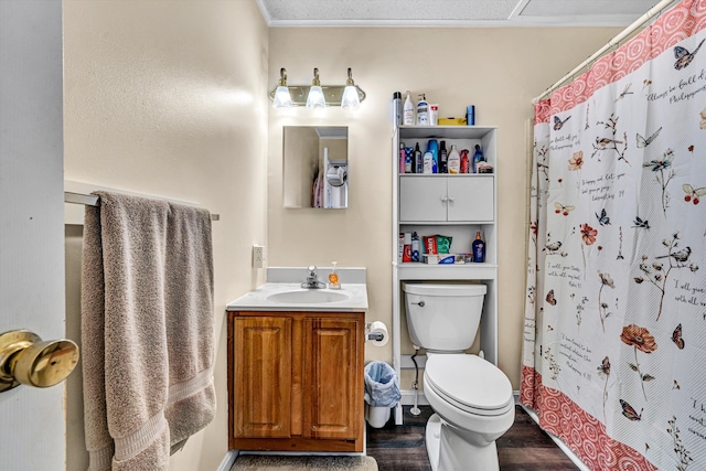 full bathroom with vanity, a shower with curtain, toilet, and wood finished floors