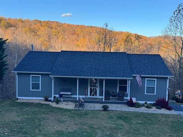 ranch-style house with a front lawn