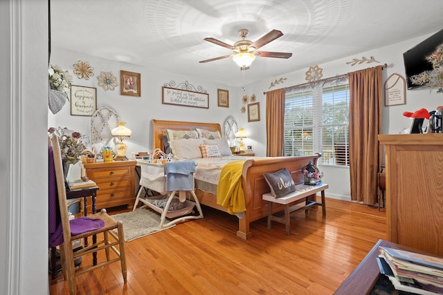 4348 Stewartsville Rd, Moneta, VA 24121 - bedroom with ceiling fan and wood-type flooring
