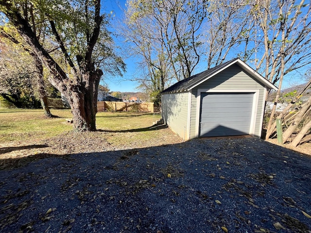 garage with a yard