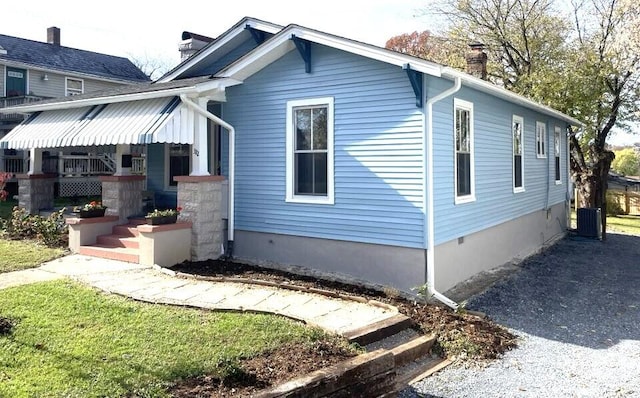 view of home's exterior with a porch