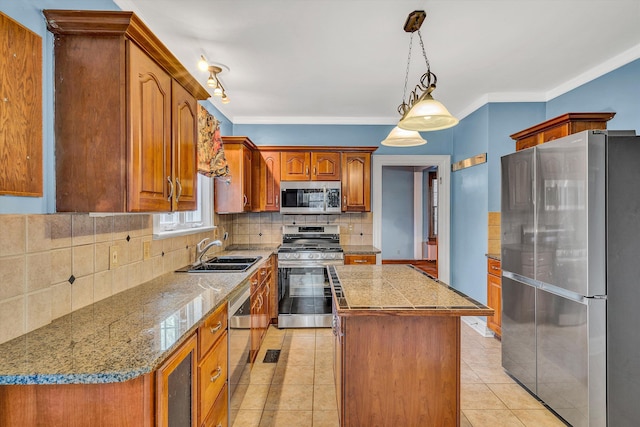 kitchen with sink, a center island, light tile patterned floors, and appliances with stainless steel finishes