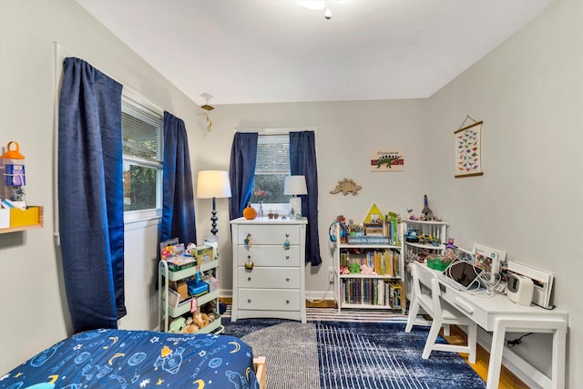 bedroom featuring hardwood / wood-style flooring