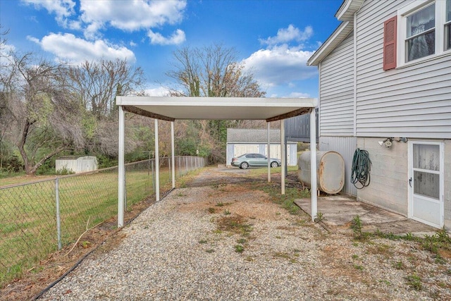 exterior space with a carport