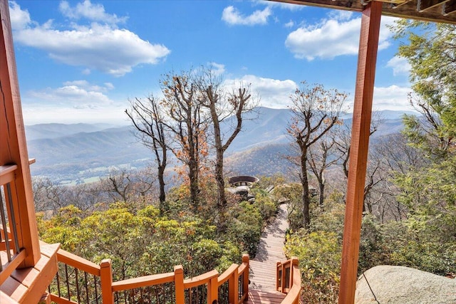 wooden terrace with a mountain view