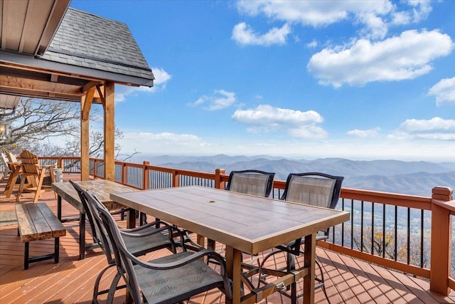 wooden terrace with a mountain view