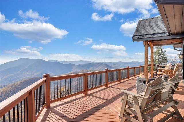 wooden terrace with a mountain view