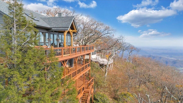 view of yard with a wooden deck