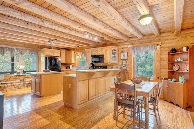 kitchen with a kitchen island, light hardwood / wood-style flooring, wood ceiling, and black appliances