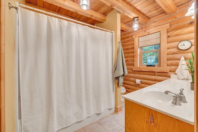 full bathroom with tile patterned flooring, beam ceiling, vanity, wooden ceiling, and toilet