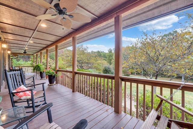 wooden deck with ceiling fan