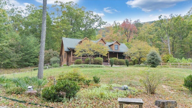 view of front of home with a front lawn