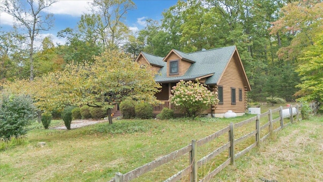 view of home's exterior featuring a lawn