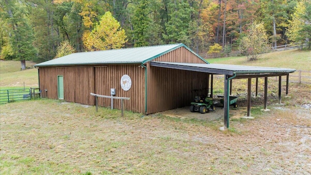 view of outbuilding with a lawn