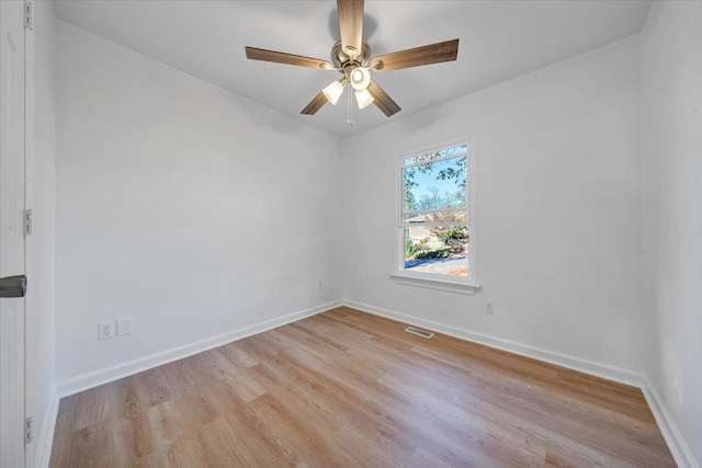 unfurnished room with ceiling fan and light hardwood / wood-style flooring