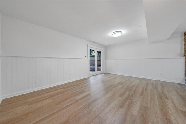 unfurnished room featuring light hardwood / wood-style flooring